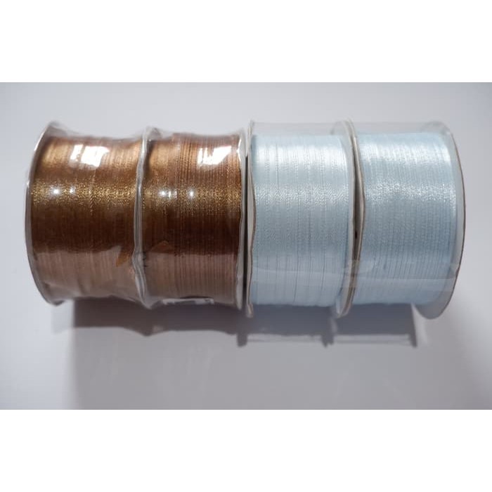 

Pita / Ribbon Satin 1/8 ( 0,3 cm /+-72 M) Coklat Tua, LIght Steel Blue - Cokelat