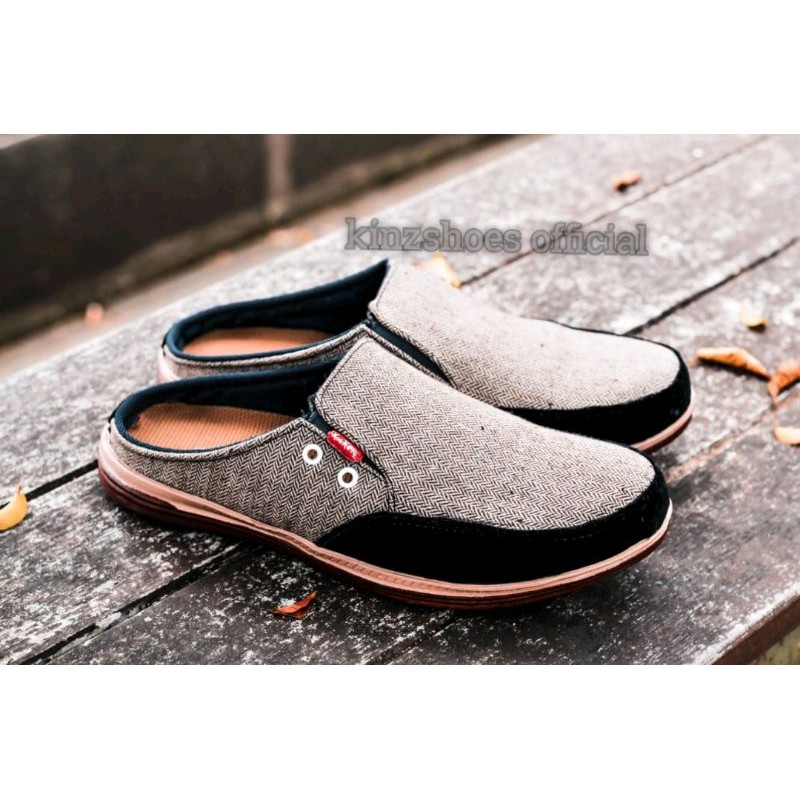 Sepatu Casual Pria Slip On Kickers Bustong