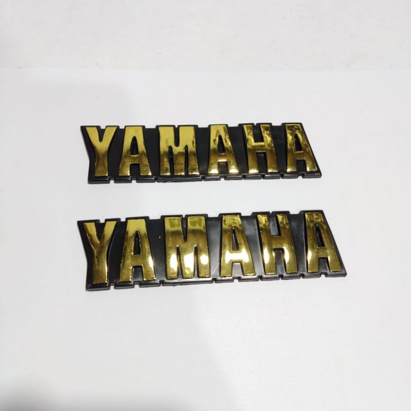 Emblem tangki RX king tulisan Yamaha gold