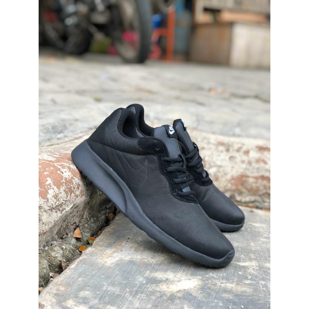 nike tanjun leather