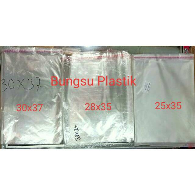 PLASTIK BAJU PLASTIK OPP BENING 30X37 CM /  OPP 28X35 CM / OPP 25X35 CM