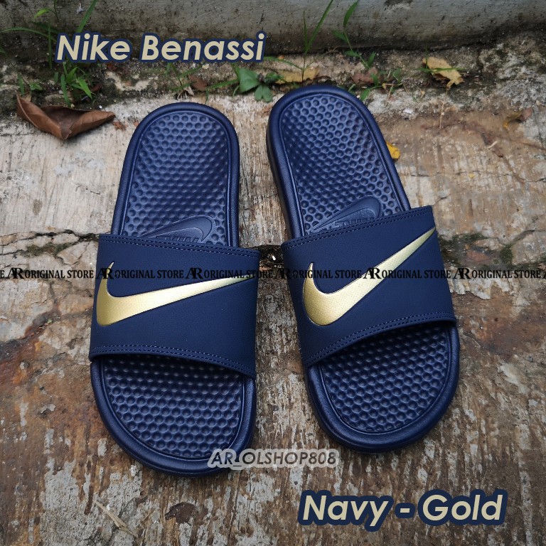 red nike slides gold swoosh