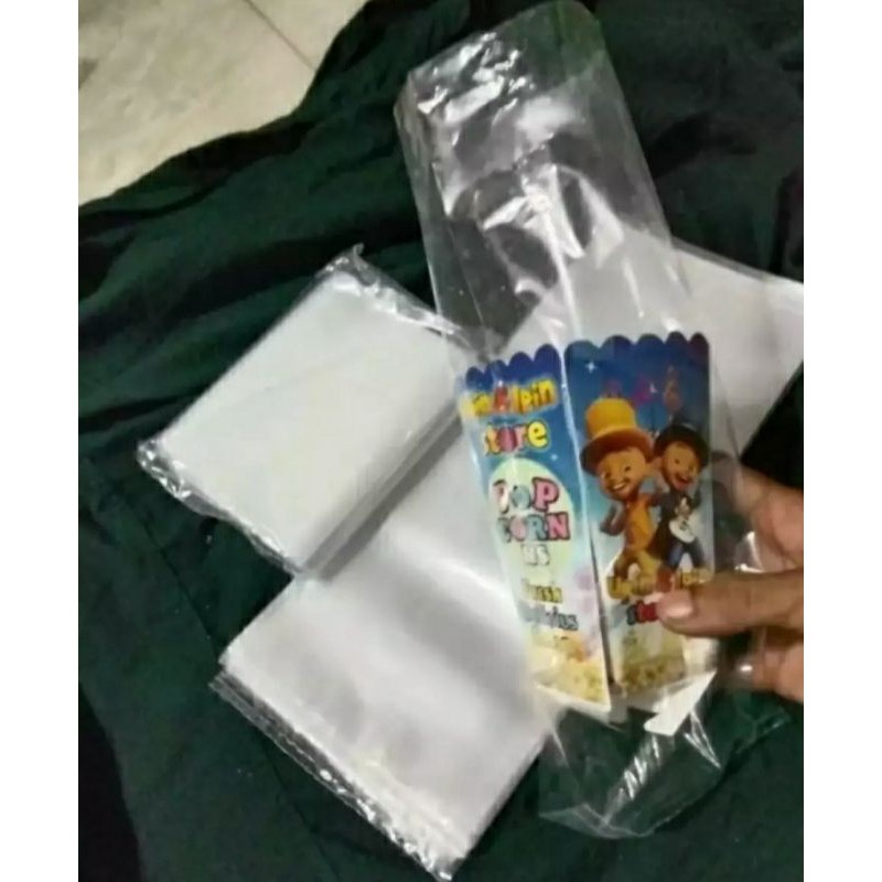 

PLASTIK- BUNGKUS POPCORN/JAGUNG POPCORN/ WADAH POPCORN (JAGUNG POPCORN) TERLARIS UKURAN 13 X 30 CM