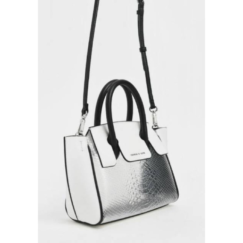 [preloved] Charles & Keith Metallic Snake Print Trapeze Bag Transparent Sling CK Cnk Original Store