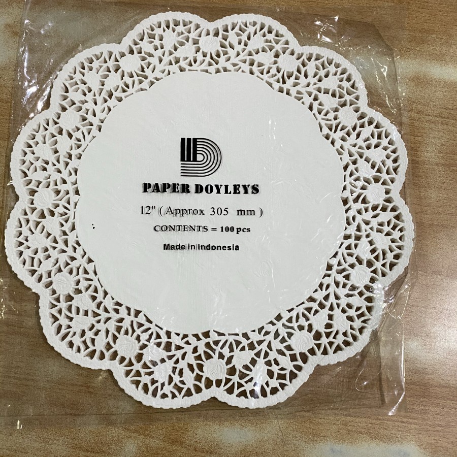 

Doyley paper round 12 inch white pack doiley / kertas renda tatakan