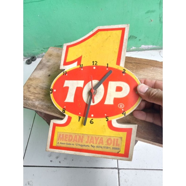 Jam dinding oil Top one vintage