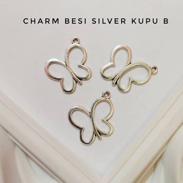 Charmbesi silver kupu B