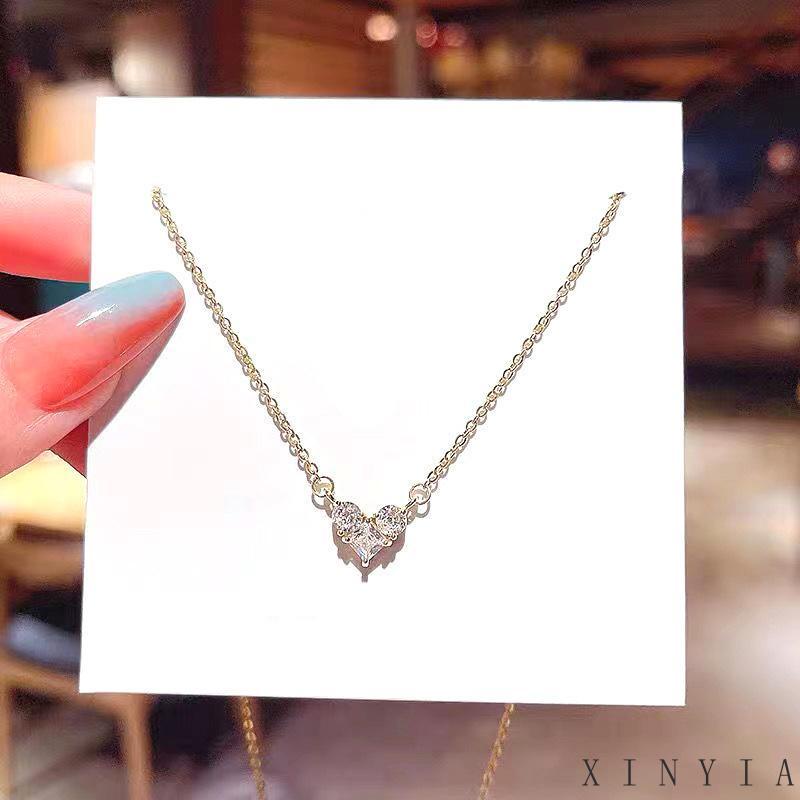 Kalung Liontin Hati Bahan Titanium Steel Aksen Zircon Untuk Wanita