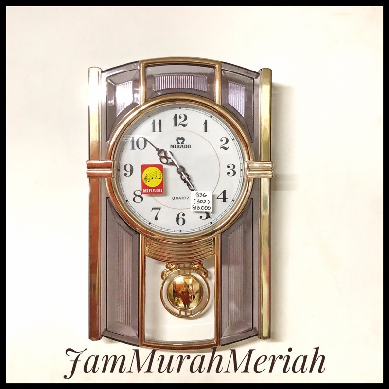 Jam Dinding Bandul Bunyi Transparan Mirado 936