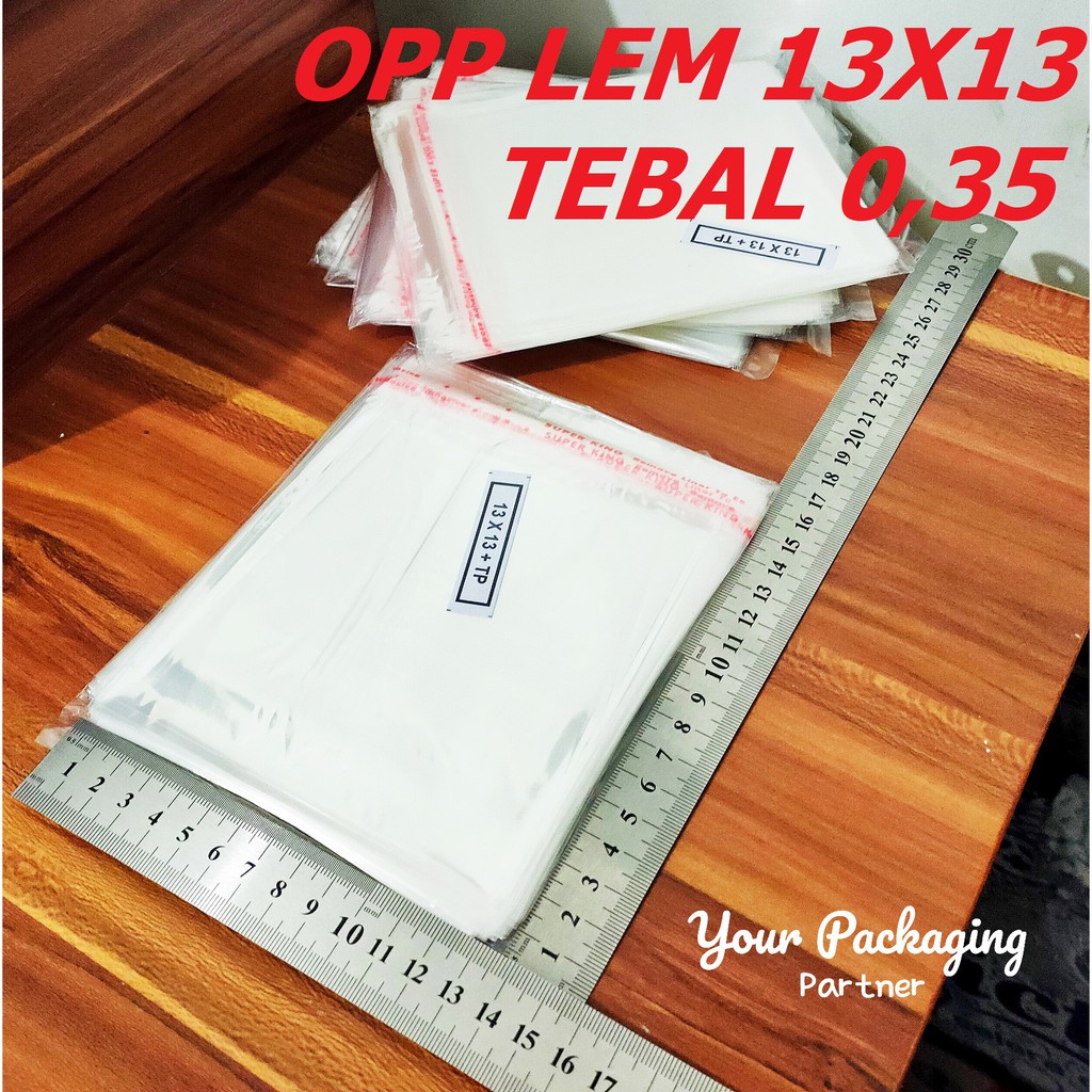  PLASTIK  OPP  13X13 CM TEBAL  18 MIC SEAL LEM BUNGKUS 