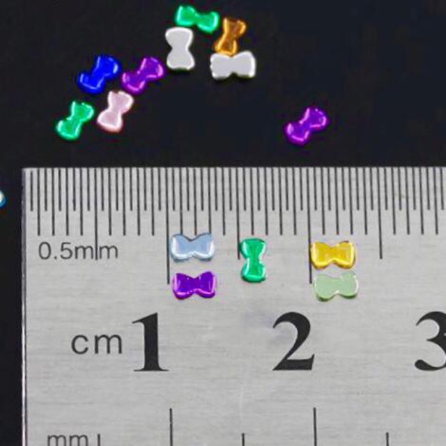 Permata gigi DIAMOND TEETH / PERMATA GIGI MOTIF PITA / KRISTAL GIGI / DIAMOND SLOVAKIA