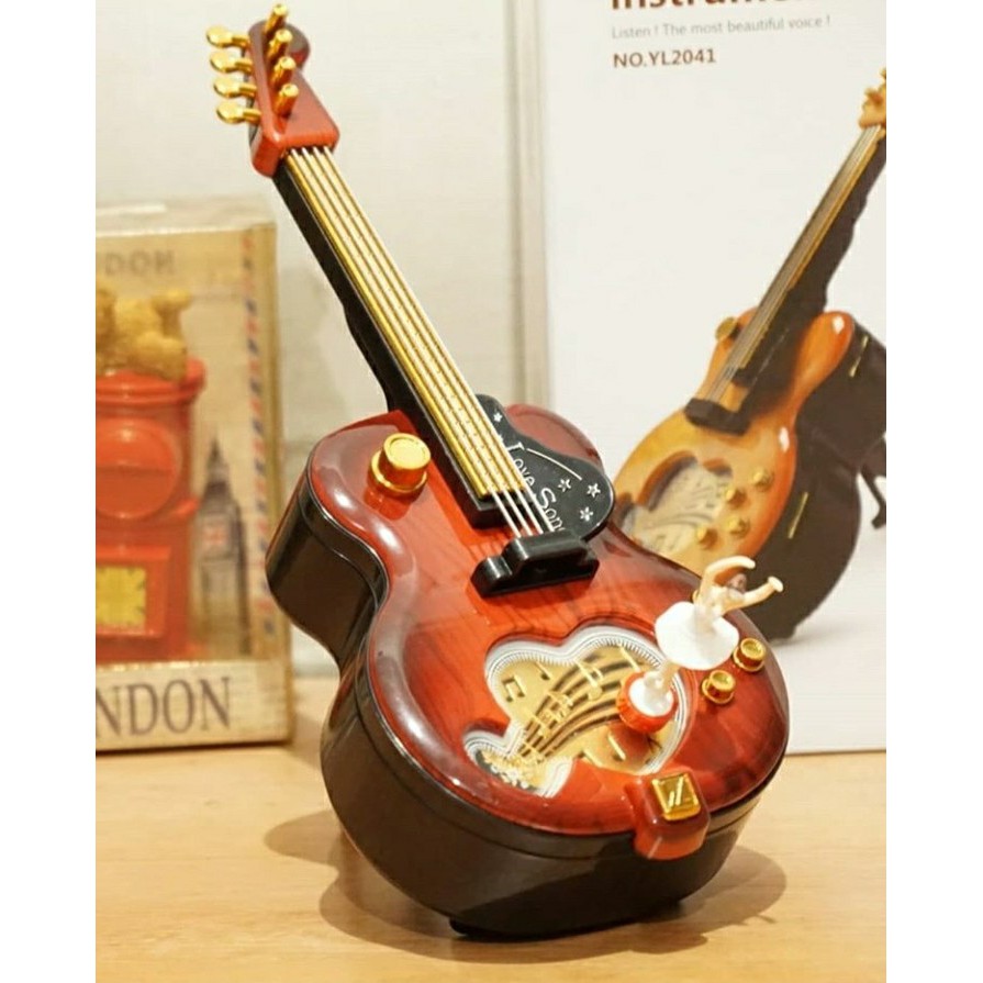 

Kotak Musik Gitar Balerina Kado Ulang Tahun