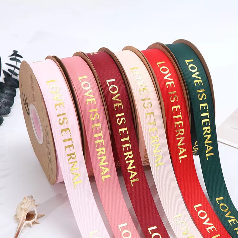 

Pita Satin “LOVE IS ETERNAL” Pita Kado Lebar 2.5cm / Ribbon (PER METER)