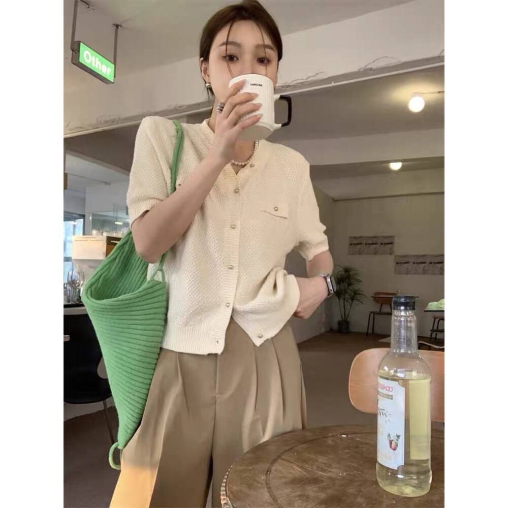 Baju atasan wanita rajut import lengan pendek kancing hidup warna cream