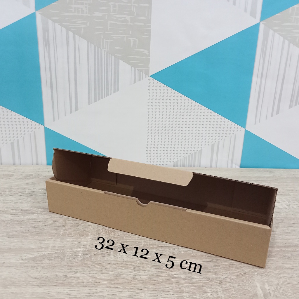 

Kardus 32x12x5 cm....Die Cut kotak aksesoris dll