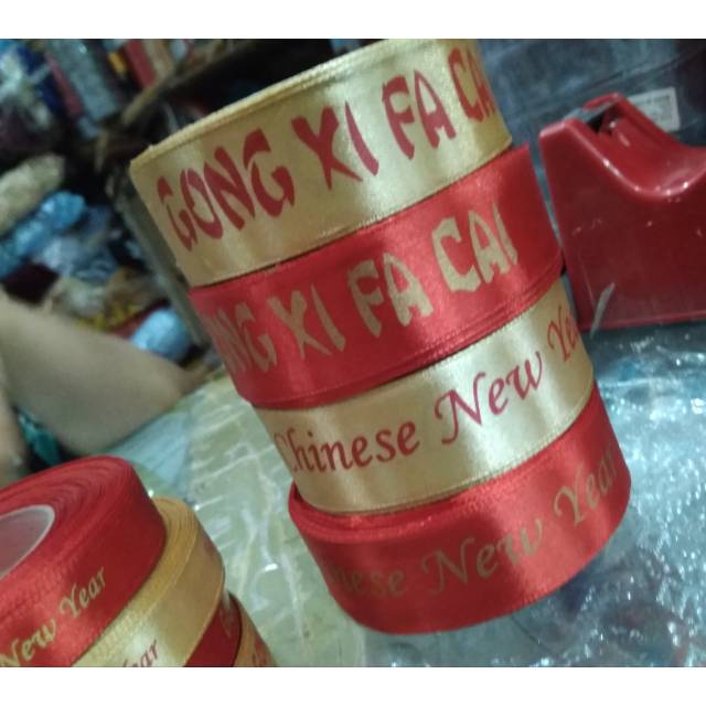 

Pita satin imlek harga satu rol