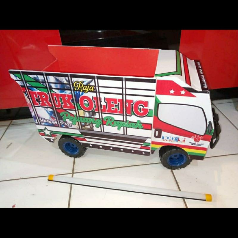 Mainan mobil truck oleng