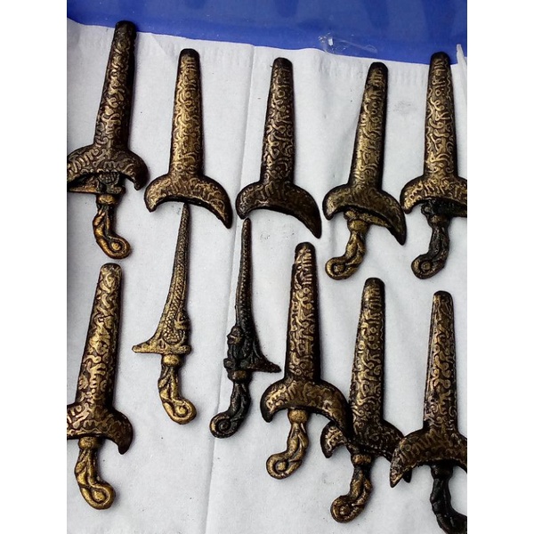 keris naga kuningan