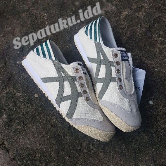 SEPATU 0N1TSUKA PARATY TANPA TALI BAHAN KANVAS (BISA COD) REAL PICT CREAM HIJAU