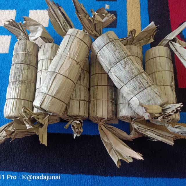 

gula kabung belitung bungkus daun dan bungks plastik i