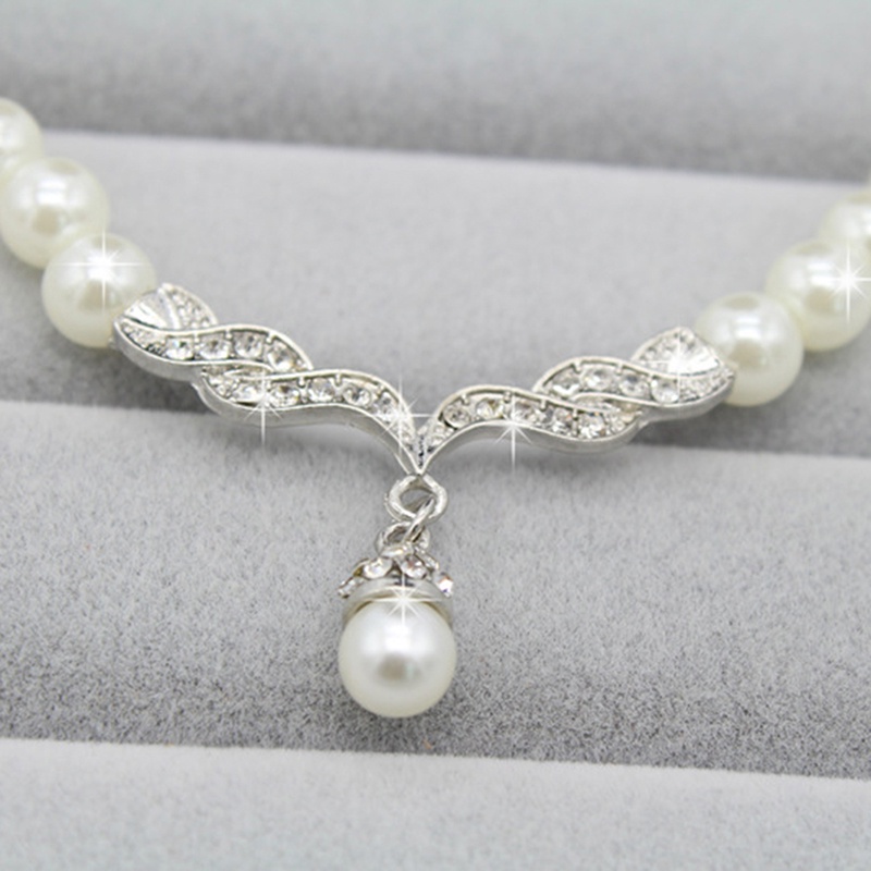 Set Perhiasan Kalung Anting Bentuk Sayap Malaikat Aksen Mutiara Tiruan Untuk Pernikahan Wanita