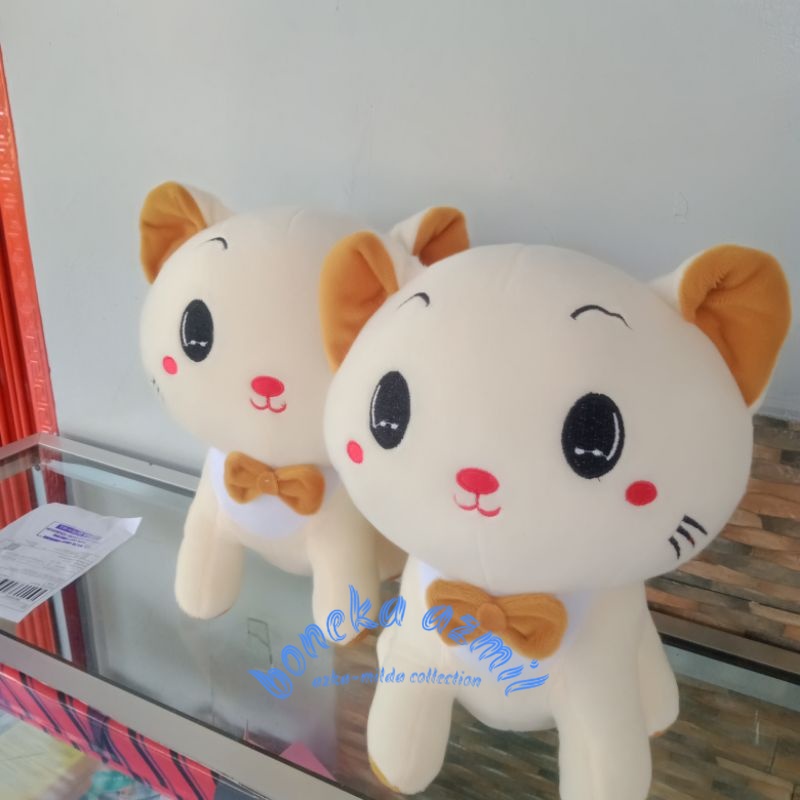 Boneka kucing duduk manis size l