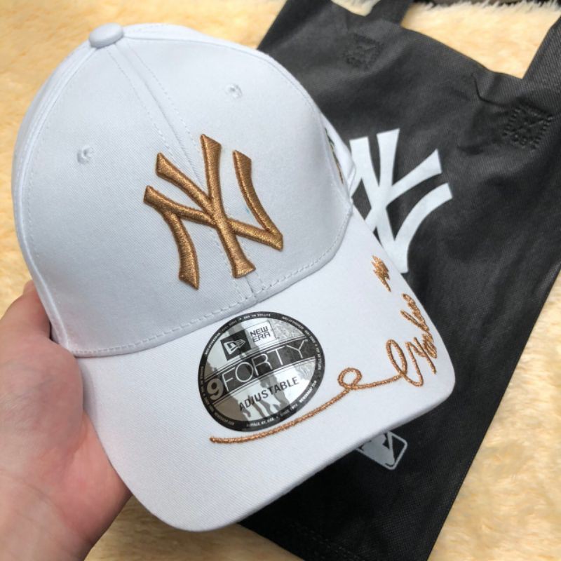 topi new era white gold original