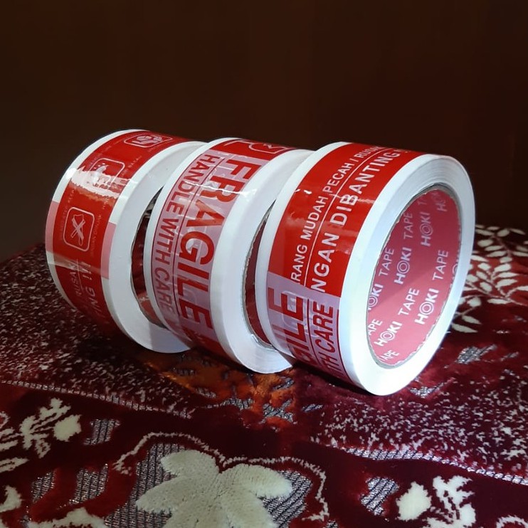 

Khusus Gojek/Grab 1 Dus isi 72 Lakban Fragile Merah Putih 48mmx100meter