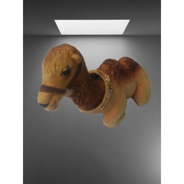 boneka onta arab duduk