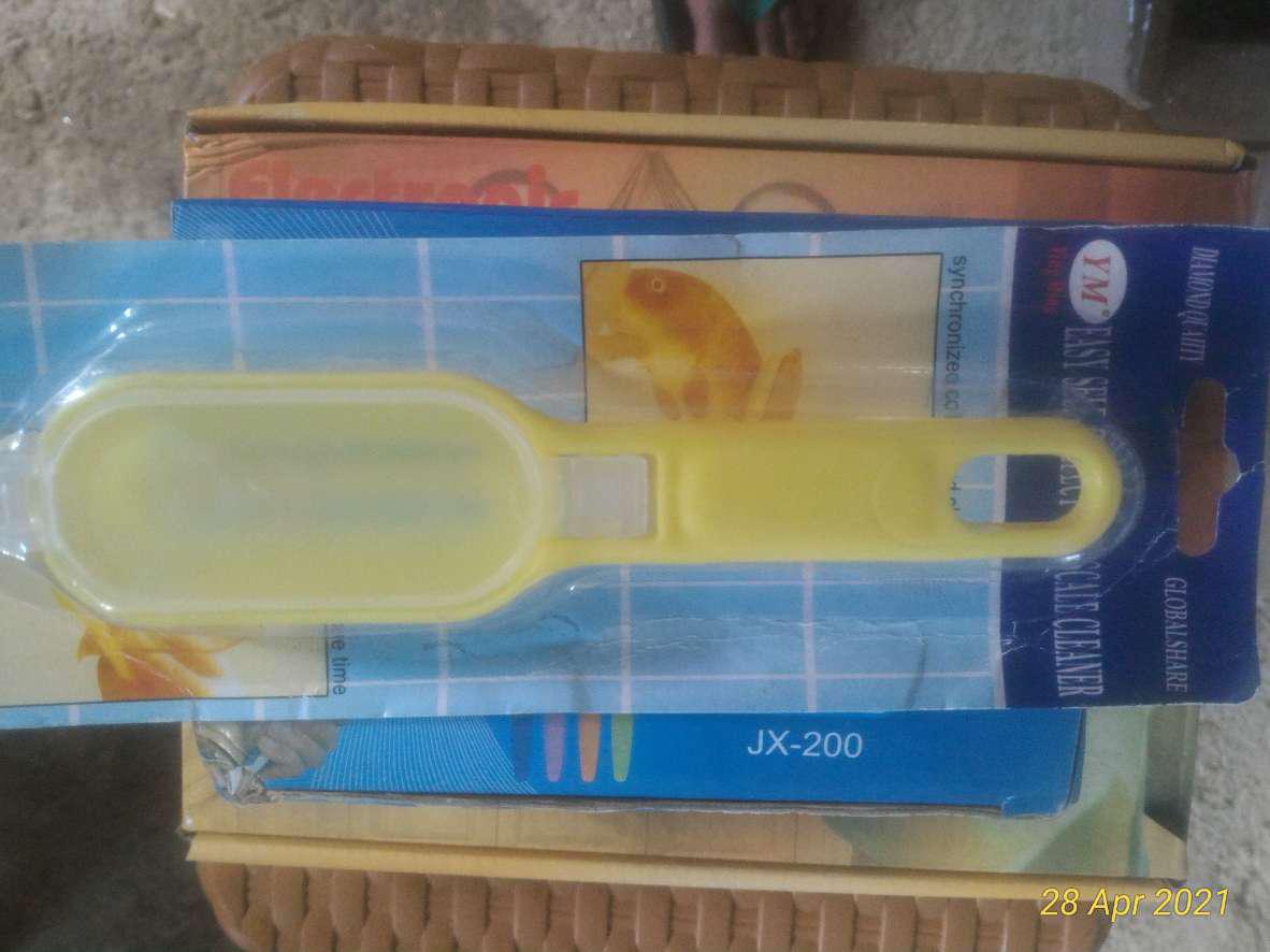 Pembersih Sisik Ikan