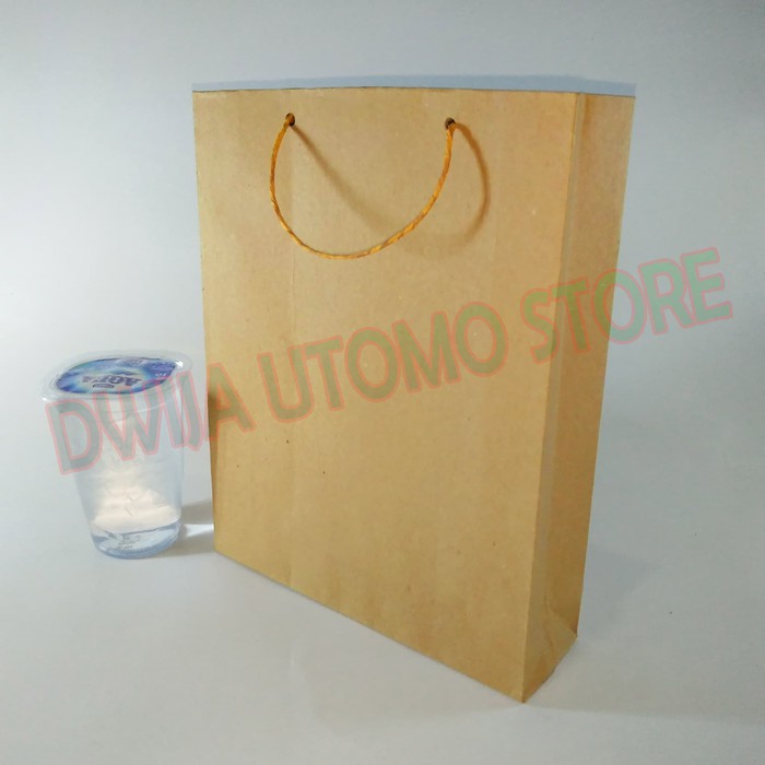 

Paperbag, Tas Kertas Kraft Coklat ukuran 18x6x23 per pack (100pcs)