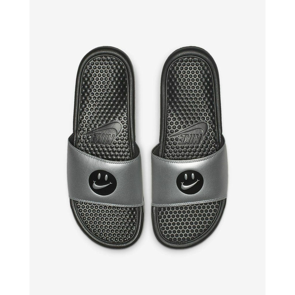 nike slides with smiley face