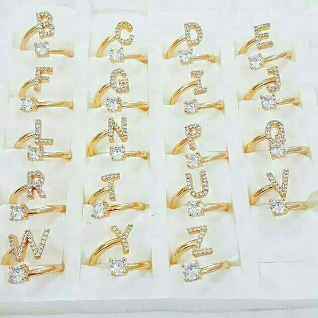 Cincin abjad lapis emas