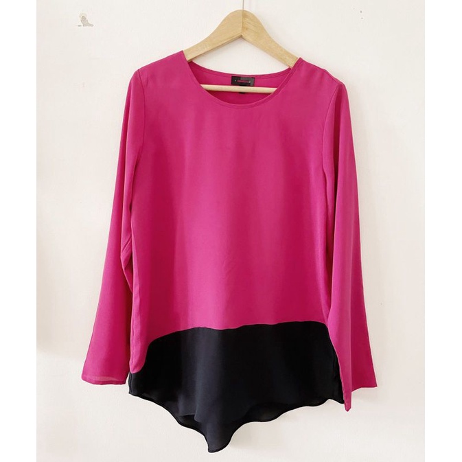 The limited Asymmetric blouse