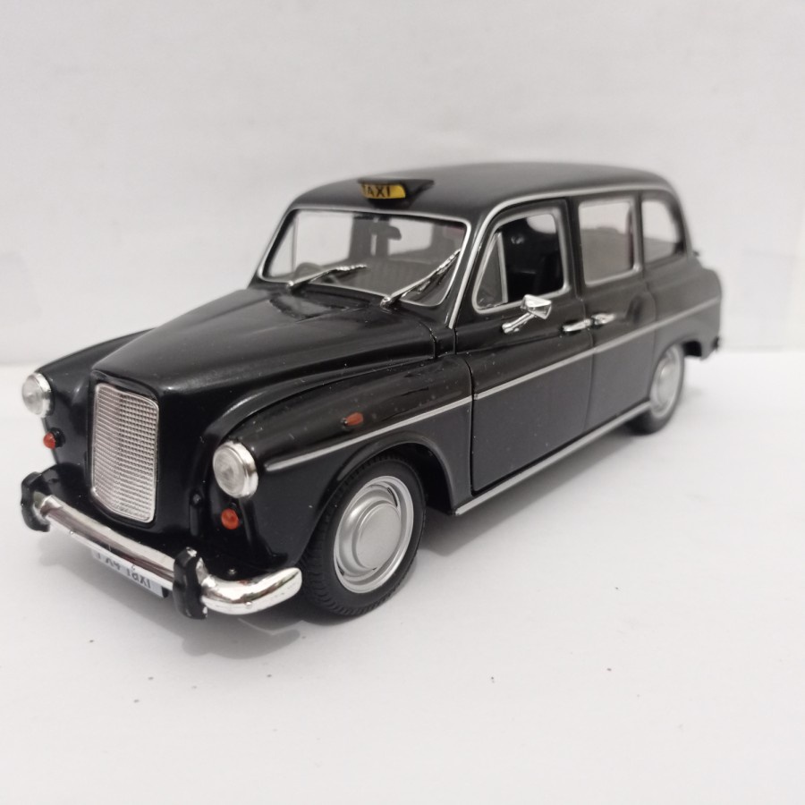 Diecast mobil London taxi Austin FX4 Welly 1:24 mainan koleksi harga murah
