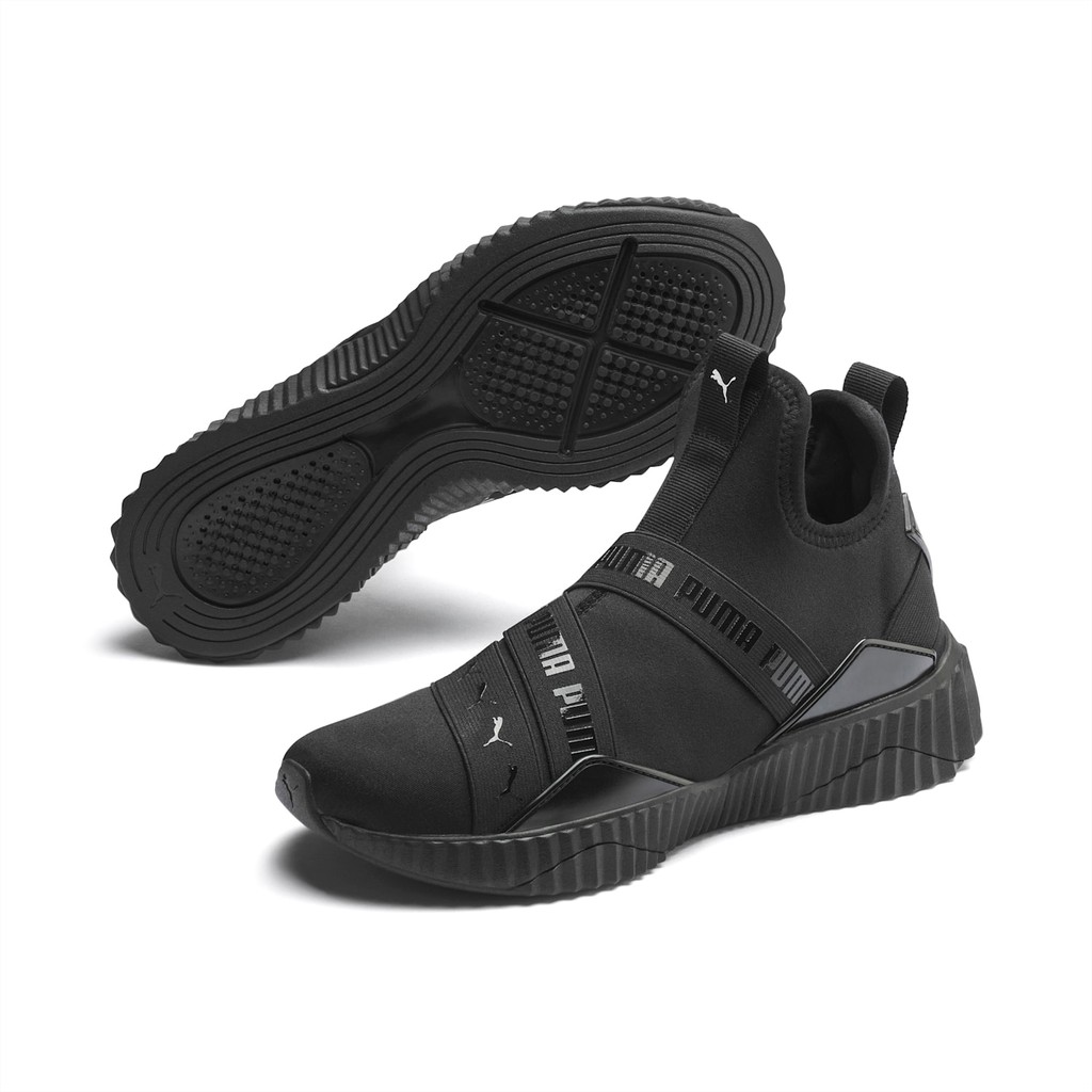 puma defy mid black and gold