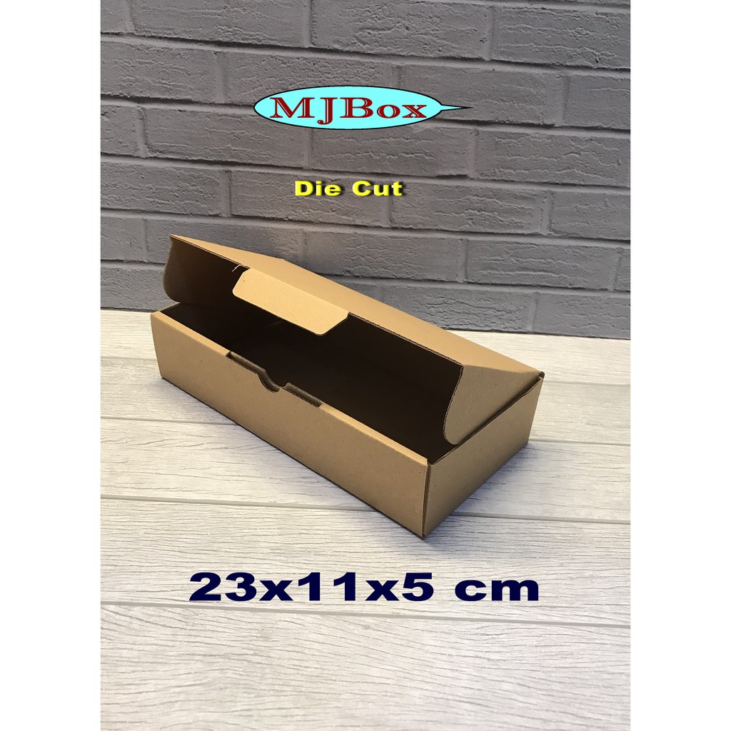 

Kardus 23 x 11 x 5 cm..... Die Cut
