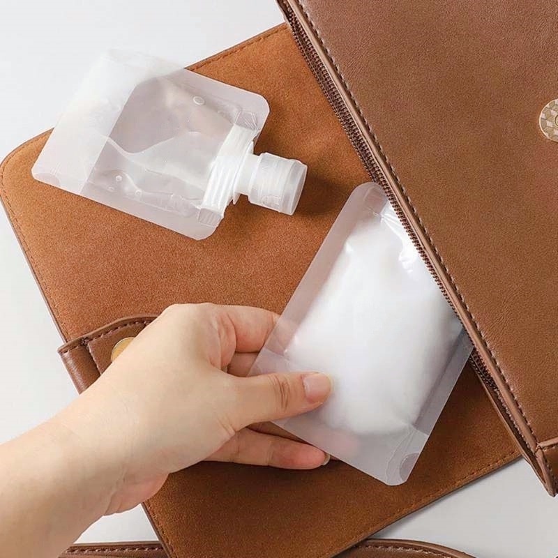 1 Pc Kantong Penyimpanan Lotion / Sampo Cair Bahan Plastik Ukuran 30ml 50ml 100ml Dengan Corong Stiker Untuk Travel