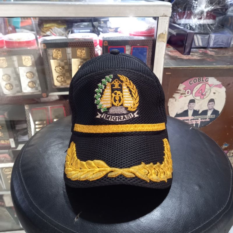 TOPI IMIGRASI