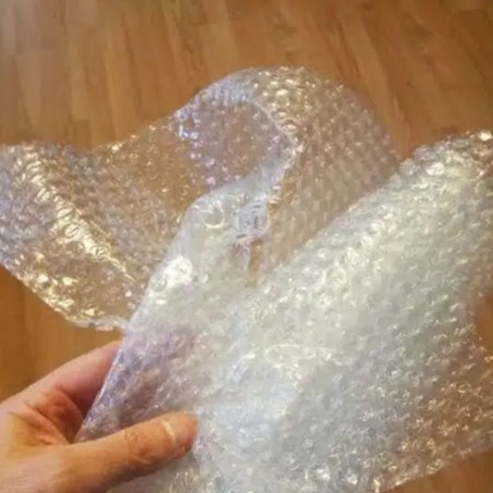 

BUBBLE WRAP PACKING TAMBAHAN PAKET AGAAR PAKET AMAN