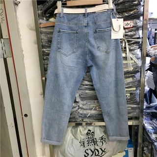  Celana  Panjang Model  High Waist Silang Kaki  Bahan Jeans 