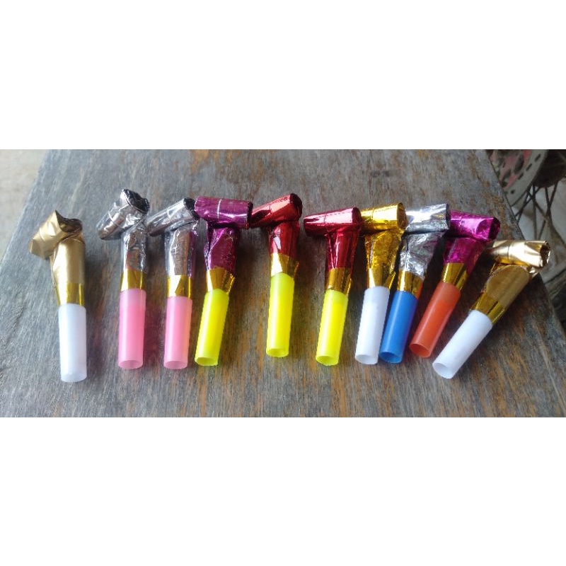 mainan terompet lidah