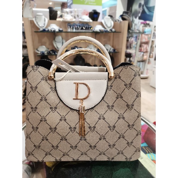 Tas jinjing wanita merk Scada