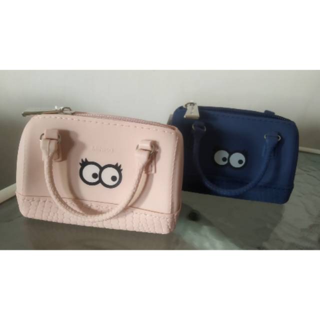 MINISO  6WRN. CUTE WINKING EYE SILICONE COIN PURSE. Dompet koin jelly miniso murah surabaya