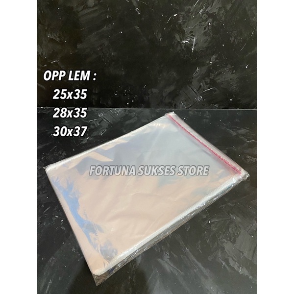 

ISI 100pcs - Plastik OPP LEM 28x35 - Kemasan Baju 28x35 - Plastik Baju 28x35 Lem