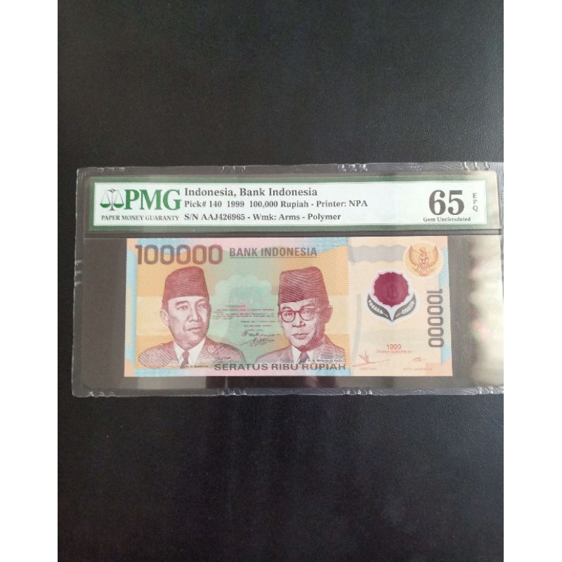 Uang kuno soekarno polymer 100000 rupiah tahun 1999 pmg 65