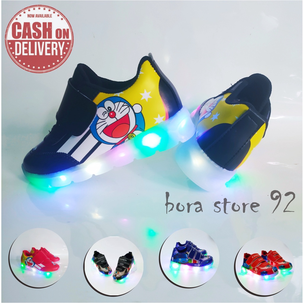 Sepatu sneaker lampu led mtif dora emon terbaru cod 1-5 thn