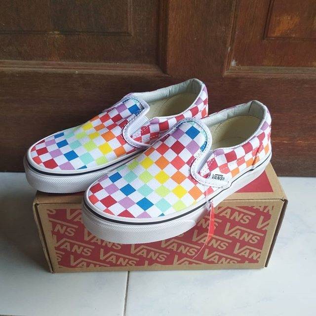 rainbow vans checkerboard slip on