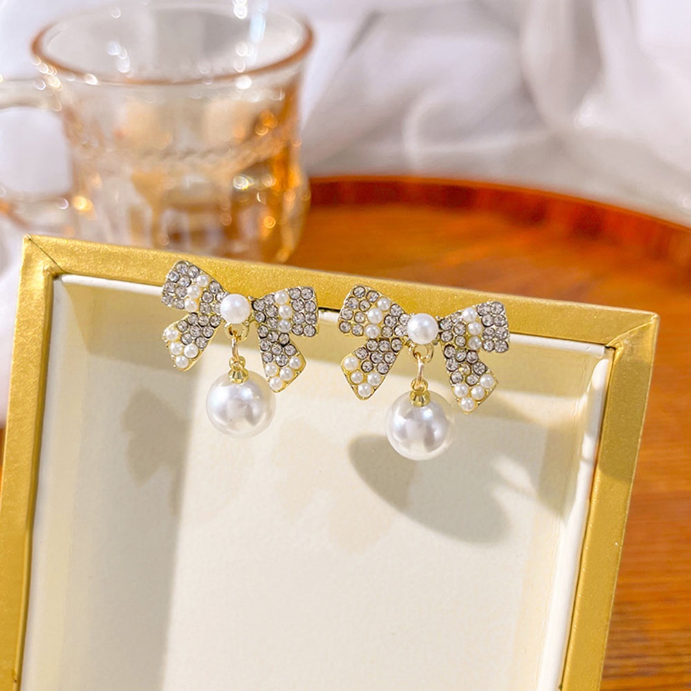 Anting Stud Desain Pita Aksen Kristal Mutiara Warna Emas Untuk Wanita