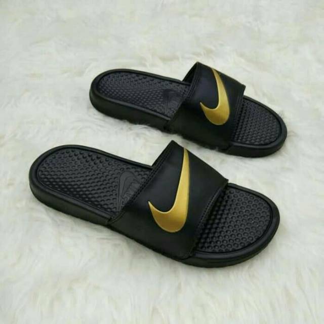 nike benassi slides gold